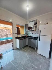 Casa com piscina em Itanhaém