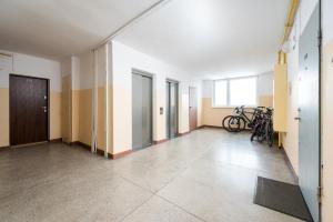 Solidarności City View Apartment by BookingHost