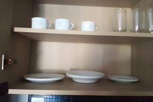 Arte Studios - Flats decorados, wifi, estacionamento, piscina, academia