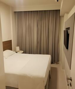 Arte Studios - Flats decorados, wifi, estacionamento, piscina, academia