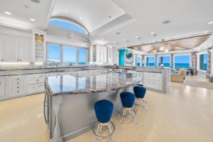 Beach Castle l Private Beachfront home with heated pool ping pong and pool table