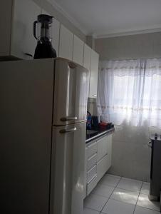 Pé na areia, praia Ocian