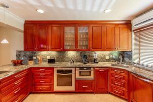 Modern Oceanfront Condo with a Chic Coastal Design, Resort-Style Amenities, and Direct Beach Access