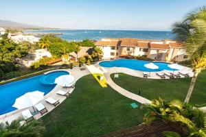 Luxury Ocean view Condo with Golf Cart