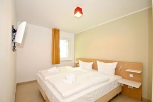 strandnahe FeWo mit Terrasse, gratis Nutzung vom AHOI Erlebnisbad und Sauna in Sellin - Rex Rugia FeWo 30-3