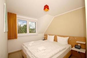 strandnahe FeWo mit Balkon, gratis Nutzung vom AHOI Erlebnisbad und Sauna in Sellin - Rex Rugia FeWo 30-6