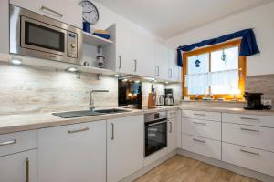 Ferienpark Freesenbruch Reihenhaus 8a - Eisbär