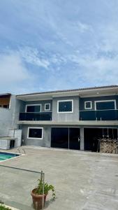Casa de praia pé na areia em Itaipuaçu