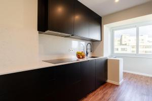 Bright Beachside Flat with Terrace by HostWise