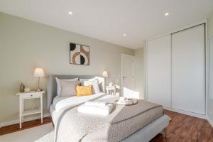 Bright Beachside Flat with Terrace by HostWise