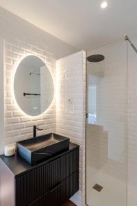 Bright Beachside Flat with Terrace by HostWise