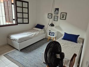 Casa martim de Sá 3 dormitórios pertinho da praia maggie