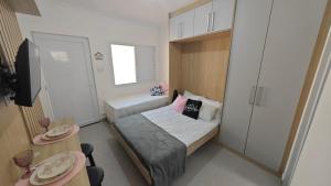Apartamento no Centro de Mongaguá, perto da praia e com ar condicionado !