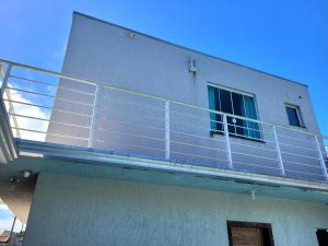 Praia de Leste Sobrado com piscina