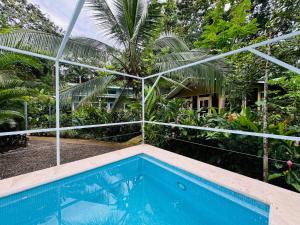 Casa Amarilla in Playa Chiquita - with shared swimming pool -