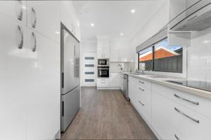 Family-Friendly 3BR Home with Yard at North Ryde