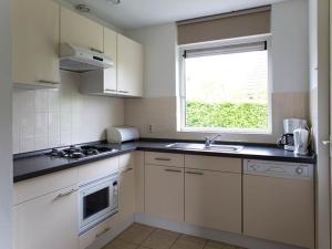 Charming forest house surrounded by a garden