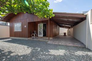 Casa c Churrasq. a 600 m da Praia NUS0636