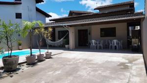 Casa na Praia Martim de Sá com Piscina