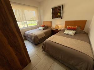 Depa de lujo en Acapulco diamante con club de playa a pie-Precio especial