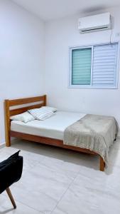 Casa completa em Praia Grande, 500 metros da praia