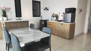 Southkey Mosaic Mid Vally Apartment by WSD