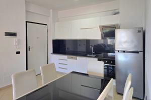 Brisa Del Mar Beachfront Apartment 116 - Happy Rentals