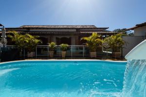Village Itaúna Inn - Casas de Temporada