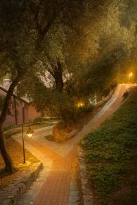 Villa Olivari Apartments & Garden, by Alma Haven