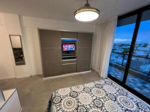 Dzain 1 - PISCINA -Gym- Cochera - Parrilla- Playromm- cercania Garrahan, favaloro, Britanico