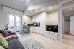 Navigli bilocale moderno con balcone sul giardino