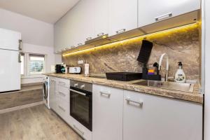 Top-Floor Flat with Balcony