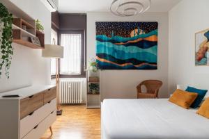 Appartamento con terrazzo sui tetti milanesi