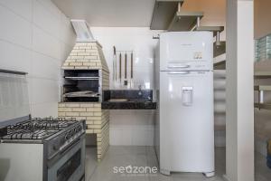 Casa 3Q pé na areia c churrasq. APC2200