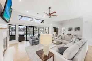 Coastal waterfront home with pool spa and dock