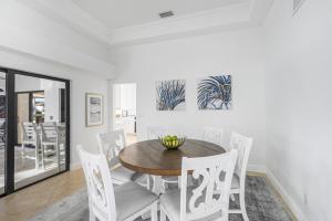 Coastal waterfront home with pool spa and dock