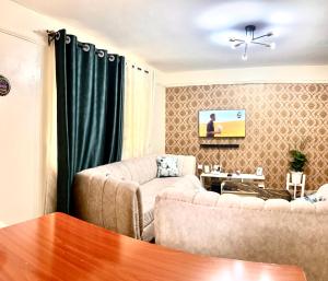 Kofis Cave - 1 bedroom Apartment with Balcony, WIFI, Gym and private Car park near Kisumu Airport
