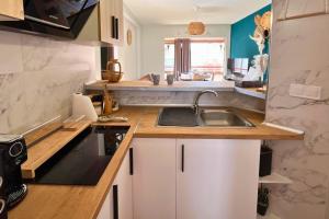 Stylish flat swimming pool parking near the beach