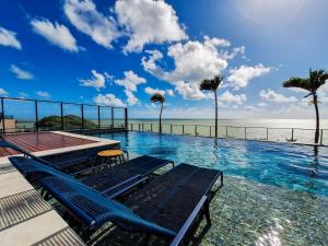 Lindo apto Pé na areia com Jacuzzi privativa