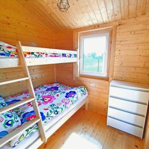 MIODOWE LATO Domki nad morzem z jacuzzi - balia z hydromasażem i basen