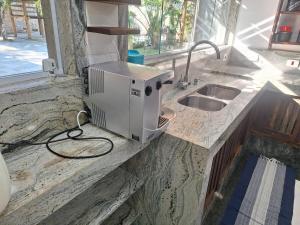 Casa na Praia com clima de Serra