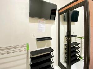 Modern D Kost RedPartner near Roxy Mall Jember