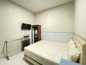 Modern D Kost RedPartner near Roxy Mall Jember