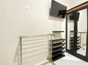 Modern D Kost RedPartner near Roxy Mall Jember