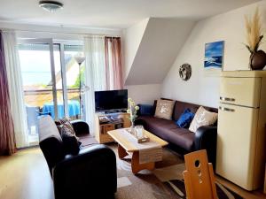 Ferienwohnung Boddenblick Breege - Balkon, Wasserblick, komplette Küche