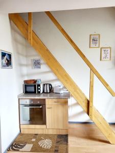 Ferienwohnung Boddenblick Breege - Balkon, Wasserblick, komplette Küche