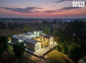 StayVista at Villa M3 - Farmstay with Lawn & Pool