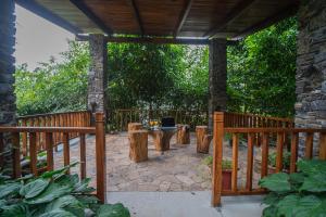 ELIVAAS Tapovan Estate 2-BHK With Kids Attic, Garden, Gazebo and Scenic Views