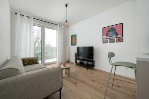 Beige Apartment in Wrocław with Parking and Balcony by Noclegi Renters