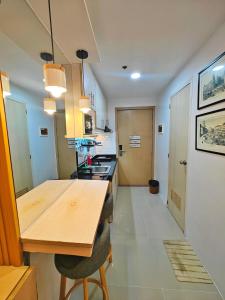 Cozy Studio at MPlace near Timog Quezon City